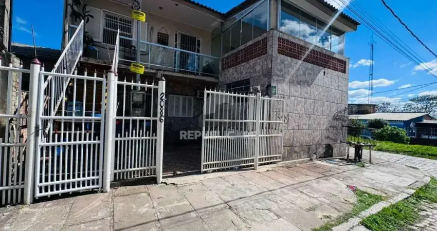 Casa com 3 quartos à venda na Acesso R Dois, 2086, Restinga, Porto Alegre