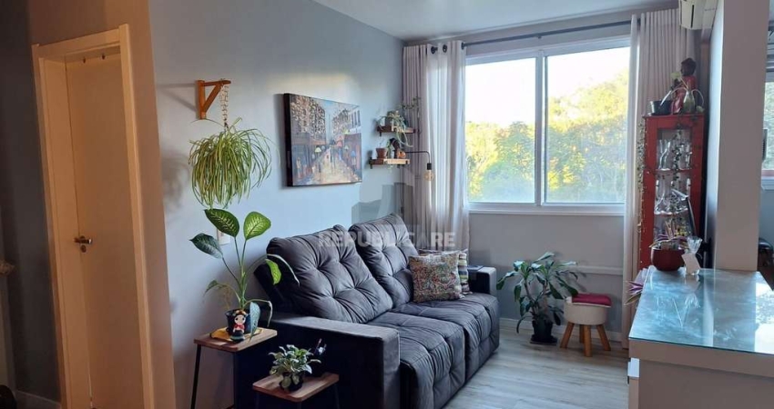 Apartamento de 2 quartos, cozinha planejada e 1 vaga escriturada.