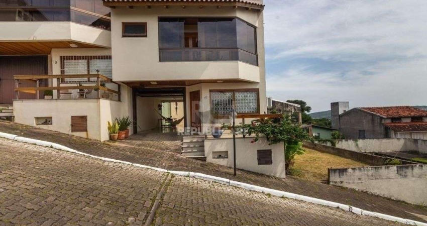 Casa em condomínio fechado com 3 quartos à venda na Rua Alcebíades Antônio dos Santos, 635, Nonoai, Porto Alegre
