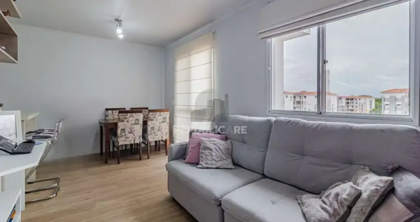 Apartamento com 2 dormitórios e 1 vaga de garagem escriturada no Bairro Humaitá