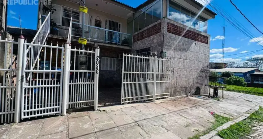 Casa residencial à venda no bairro Restinga com 3 dormitórios/quartos e 260 m².