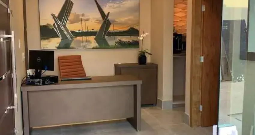 Vendo belo imóvel comercial com móveis planejados no escritório