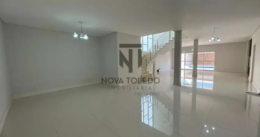 CASA EM CONDOMINIO FECHADO PARA LOCAÇÃO 5 DORMITÓRIOS SENDO 4 SUÍTES COM 680 METROS QUADRADOS.