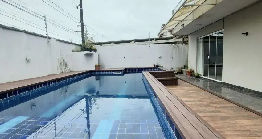 Casa com 4 dormitórios à venda, 290 m² por R$ 990.000,00 - Jardim Guaiuba - Guarujá/SP