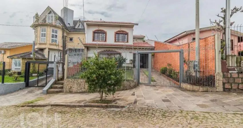 Casa com 4 quartos à venda na Rua Esteio, 220, Cavalhada, Porto Alegre