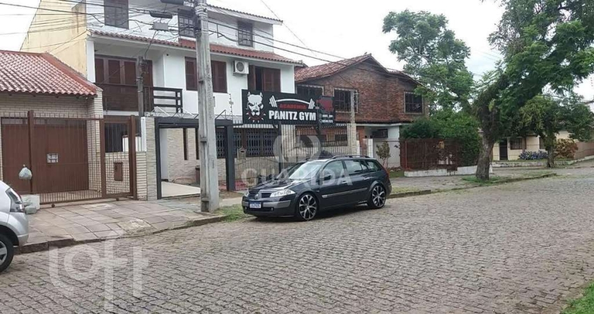 Casa com 3 quartos à venda na Rua Márcio Dias, 360, Nonoai, Porto Alegre