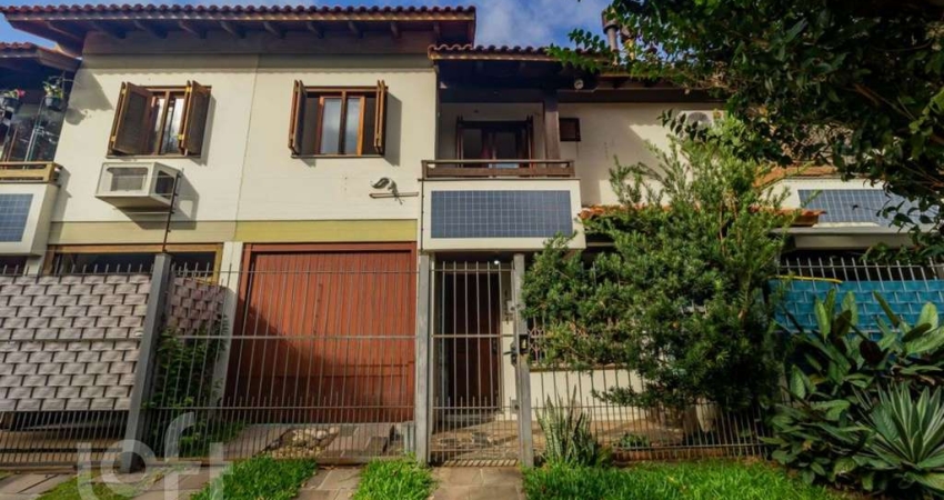 Casa em condomínio fechado com 3 quartos à venda na Rua Itapitocaí, 1031, Cristal, Porto Alegre
