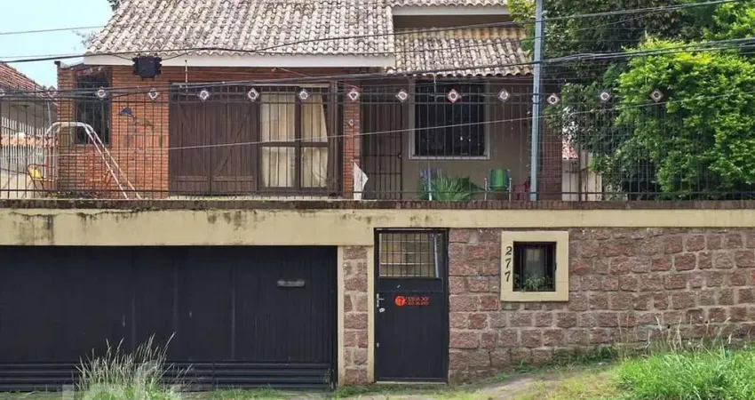 Casa com 3 quartos à venda na Avenida Deputado Aramy Silva, 277, Santa Tereza, Porto Alegre