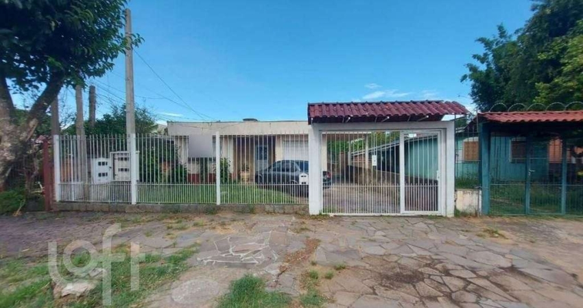 Casa com 4 quartos à venda na Rua Marquês do Maricá, 524, Vila Nova, Porto Alegre
