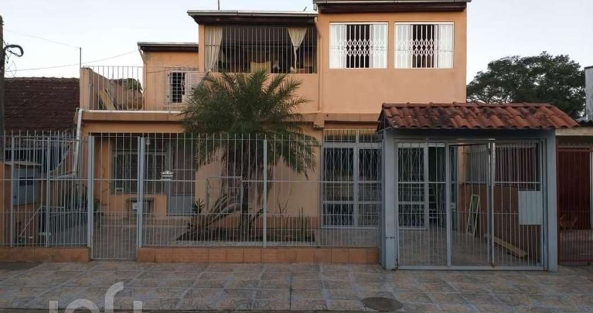 Casa com 4 quartos à venda na Acesso A Três, 4258, Restinga, Porto Alegre