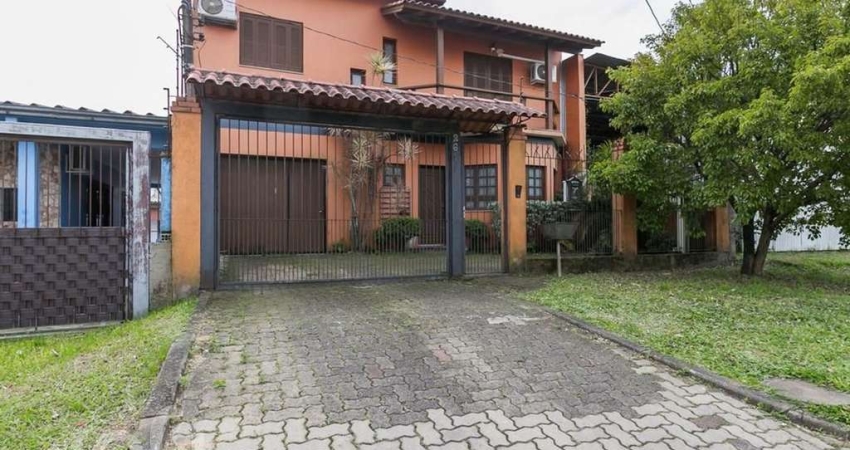 Casa com 3 quartos à venda na Rua Tomé Antônio de Souza, 267, Campo Novo, Porto Alegre