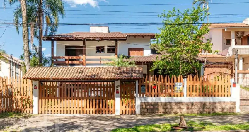 Casa com 5 quartos à venda na Rua Upamaroti, 794, Cristal, Porto Alegre