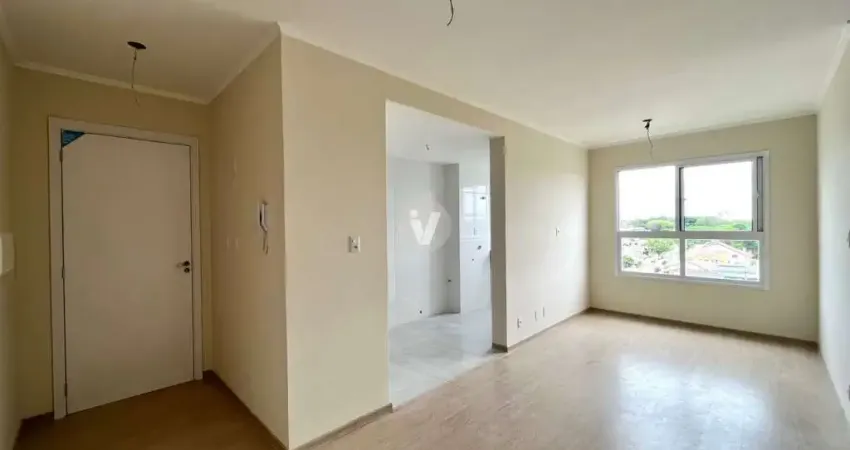 Apartamento de 2 dormitórios e com vaga de garagem.