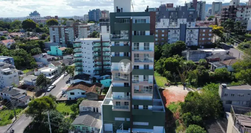 Apartamento 2 dormitórios com suíte e 2 vagas de garagem.