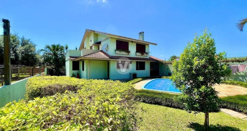 CASA NO BAIRRO CAMOBI - 5 DORMITÓRIOS E PÁTIO AMPLO