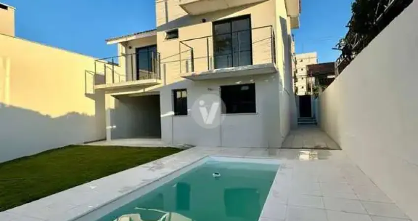 Bela casa nova à venda, 5 dormitórios, piscina, localizado no bairro lourdes!