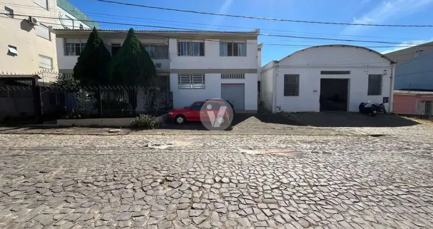 Casa comercial excelente localização com loja e pavilhão