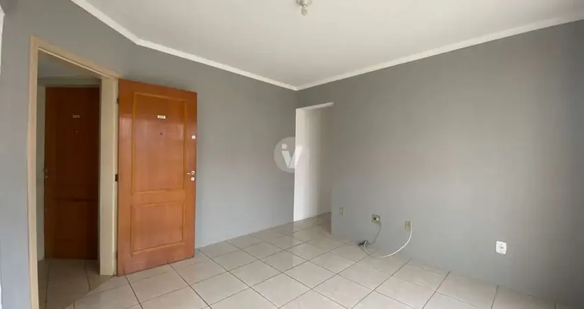 Apartamento 2 dormitórios no centro, próximo a ufn, com elevador e sacada.
