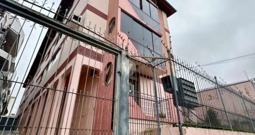 Apartamento dois dormitórios, semimobiliado a poucos minutos do centro.