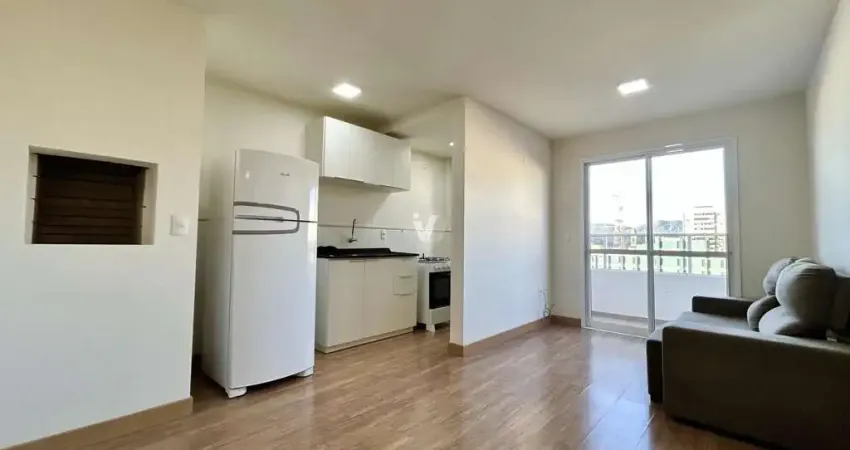 Apartamento 01 dormitório, semimobiliado e com box de garagem no centro!