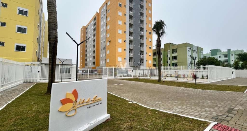 Apartamento semimobiliado com 2 dormitórios sacada e churrasqueira, no bairro Ca