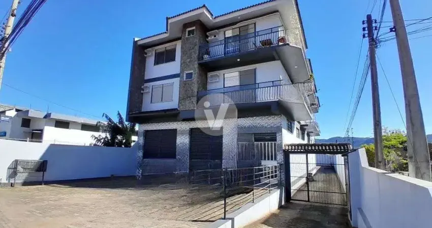 Negócio rentável em camobi, terreno de 910m², 4 aptos e sala comercial a venda!