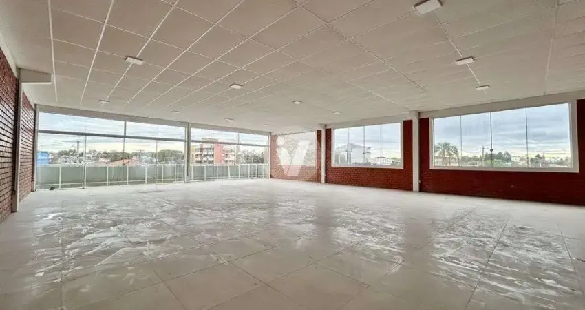 Sala comercial com estacionamento privativo, ótima localização no bairro camobi