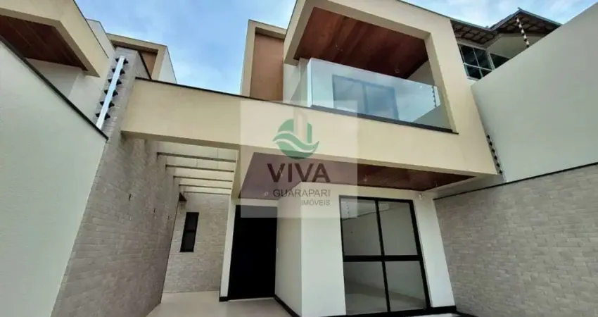 Casa composta por  3 suítes com área gourmet á venda no bairro são judas tadeu, guarapari-es - realize negócios imobiliários.
