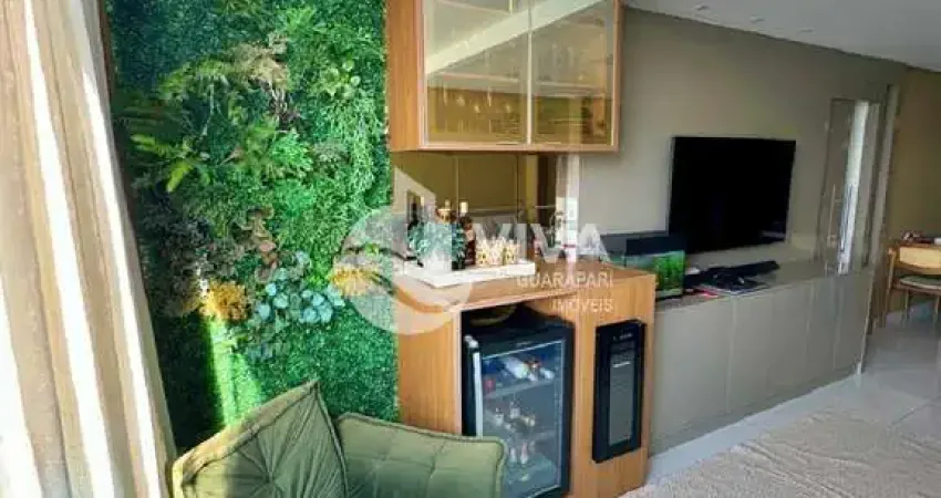 Imperdível: apartamento de 2 quartos e 1 suíte no centro de guarapari-es, com 2 salas, 2 banheiros, vaga de garagem e 70m².