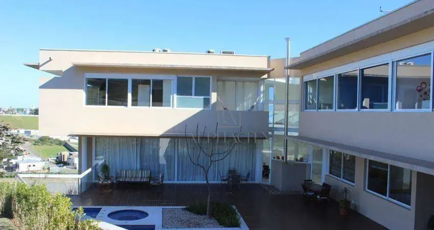 Elegante sobrado com 4 suítes e área de lazer privativa - design moderno e integrado