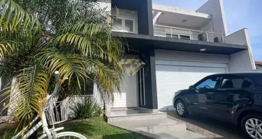 Casa à venda em esteio - bairro centro: 4 quartos (sendo 3 suítes), salão de festas e piscina