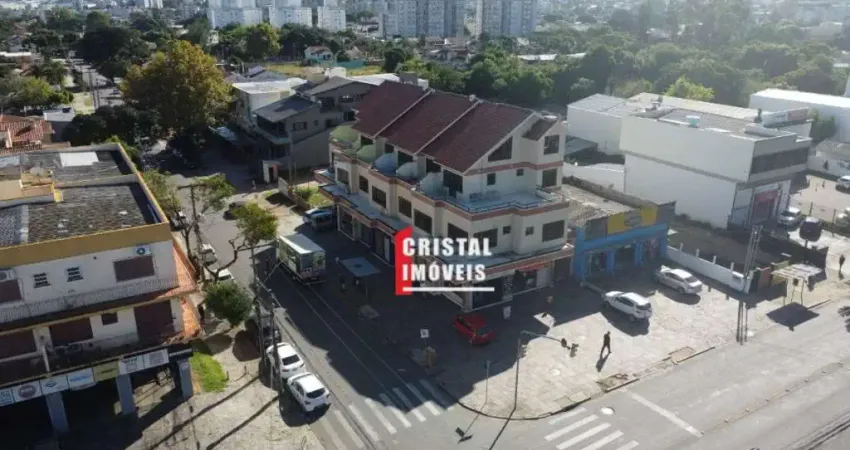 Prédio comercial com 7 lojas e 13 salas comerciais a venda no Bairro Camaquã - AV21756