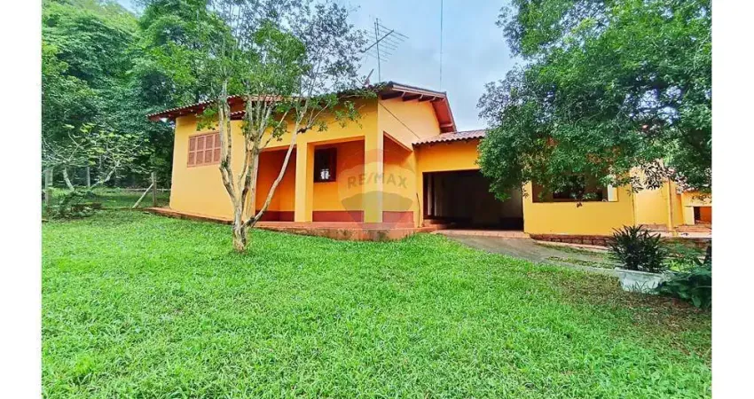 Exclusividade e conforto no bairro Tarumã, Viamão: casa estilo campo ampla, ideal para moradia ou investimento.
