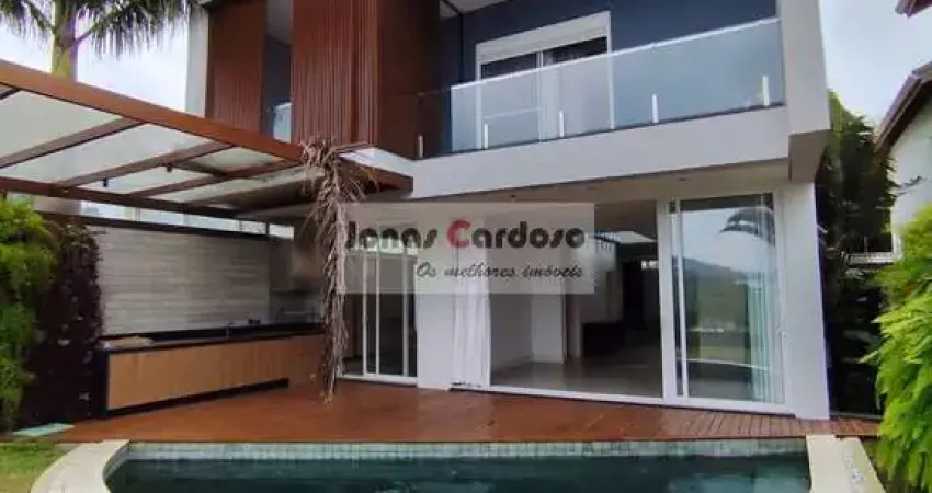 Luxuosa casa à venda no condomínio Aruã em Mogi das Cruzes-SP, com 3 quartos, 3 suítes, 3 salas, 5 banheiros, 4 vagas, 370m².