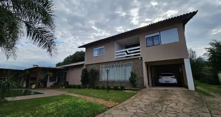 Casa com 4 dormitórios à venda, 380 m² por R$ 950.000,00 - Neópolis - Gravataí/RS