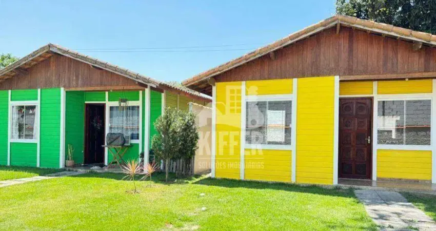 Terreno 1.000 m² com 3 casas prontas – excelente oportunidade