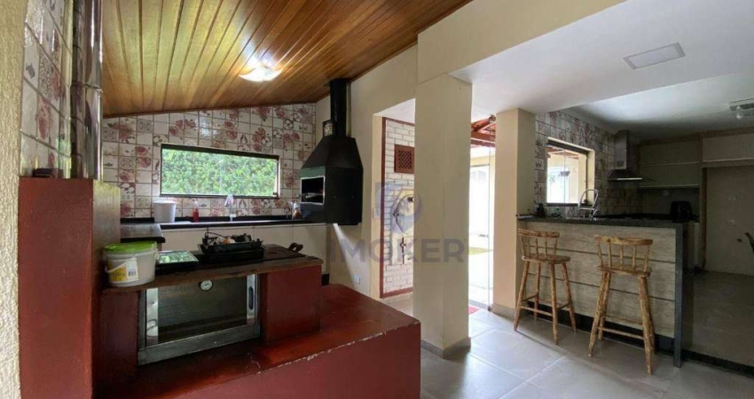 Sobrado comercial/residencial no Centro de Poá/SP; 5 dormitórios (2 suítes); 8 vagas; amplo quintal.