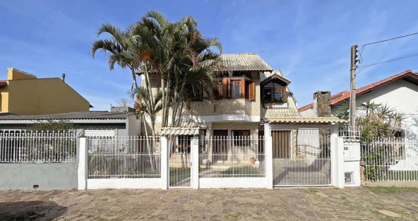 Casa com 4 quartos à venda na Avenida Guarujá, --, Guarujá, Porto Alegre