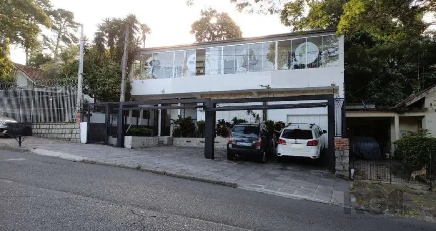 Casa com 4 quartos à venda na Rua Guadalajara, --, Jardim Itu Sabará, Porto Alegre