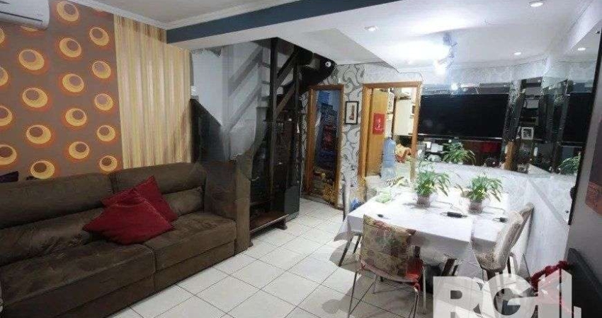 Casa residencial com 3 dormitórios 90m² privativos, e 2 vagas à venda no bairro Parque Santa Fé em Porto Alegre