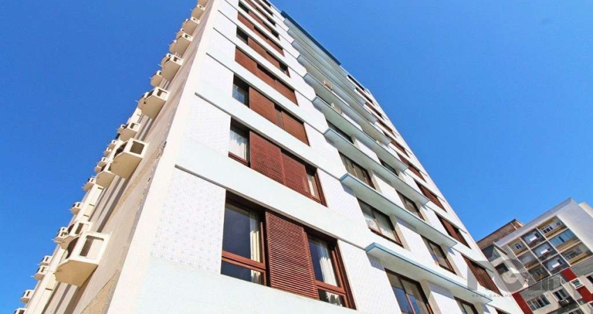 Apartamento de três quartos, suíte e uma vaga de garagem no bairro Independência em Porto Alegre.