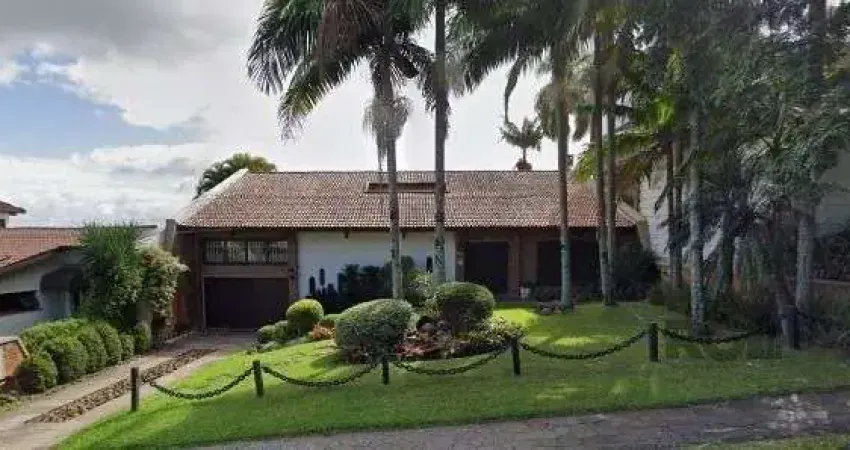 Casa em Porto Alegre, no bairro Vila Assunção, com 3 dormitório(s), à venda.