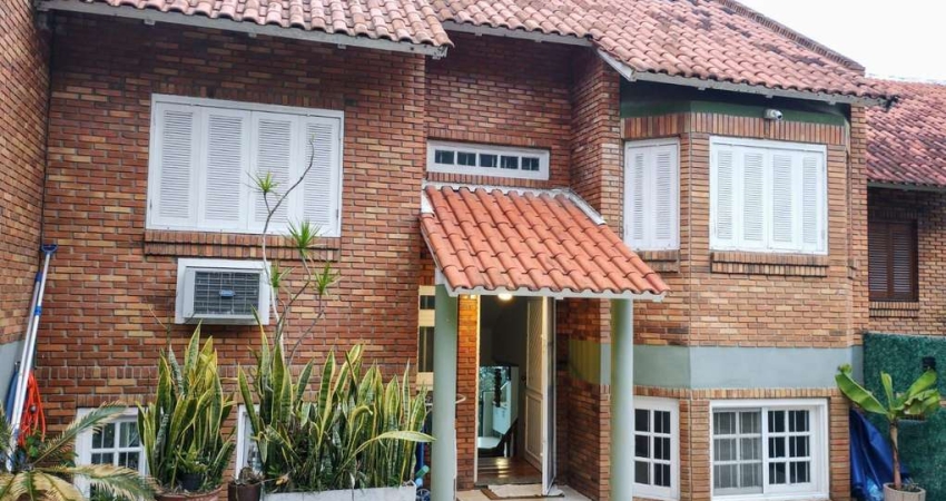 Casa em condomínio fechado com 3 quartos à venda na Rua Simão Bolívar, --, Vila Conceição, Porto Alegre