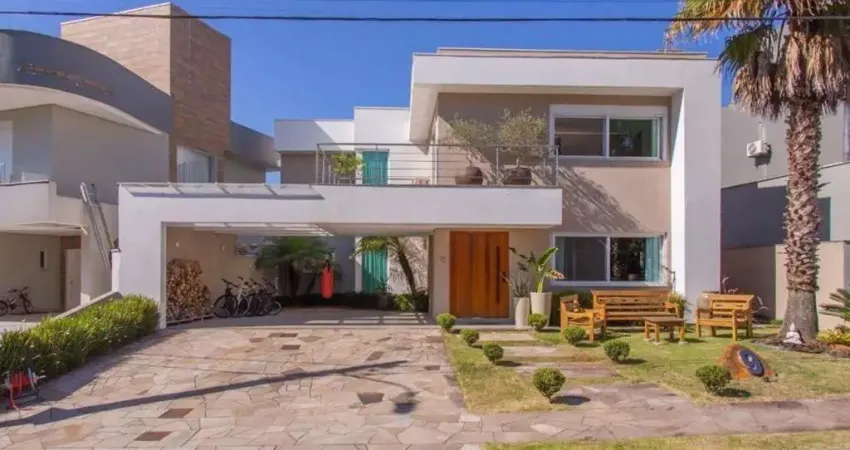 Espetacular casa de condomínio com 3 suítes, piscina com aquecimento