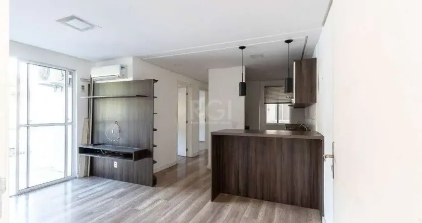 Apartamento 2 dormitórios , sala com dois ambientes , cozinha americana sacada com churrasqueira 1 vaga