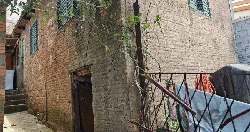 Casa com 3 quartos à venda na Rua Marquês do Maricá, --, Vila Nova, Porto Alegre