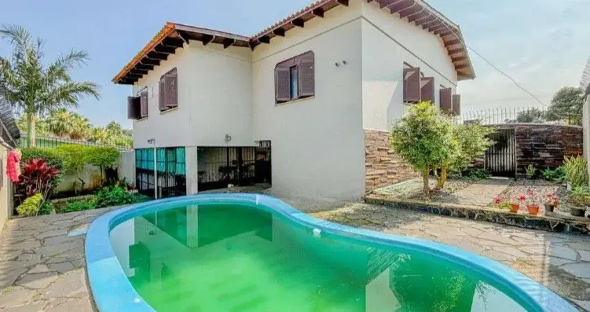 Casa com 3 quartos à venda na Avenida Clemenciano Barnasque, --, Teresópolis, Porto Alegre