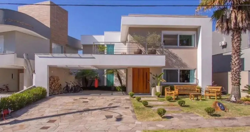 Espetacular casa de condomínio com 3 suítes, piscina com aquecimento