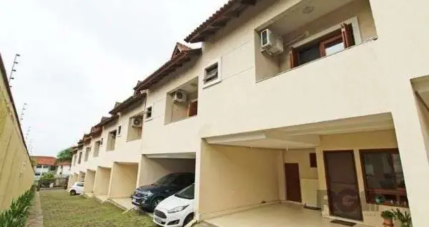 Casa Condomínio em Porto Alegre, no bairro Tristeza, com 3 dormitório(s), à vend