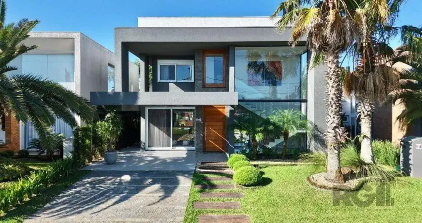 Sobrado à venda pagamento em 60x condomínio malibu beira lago com deck e piscina